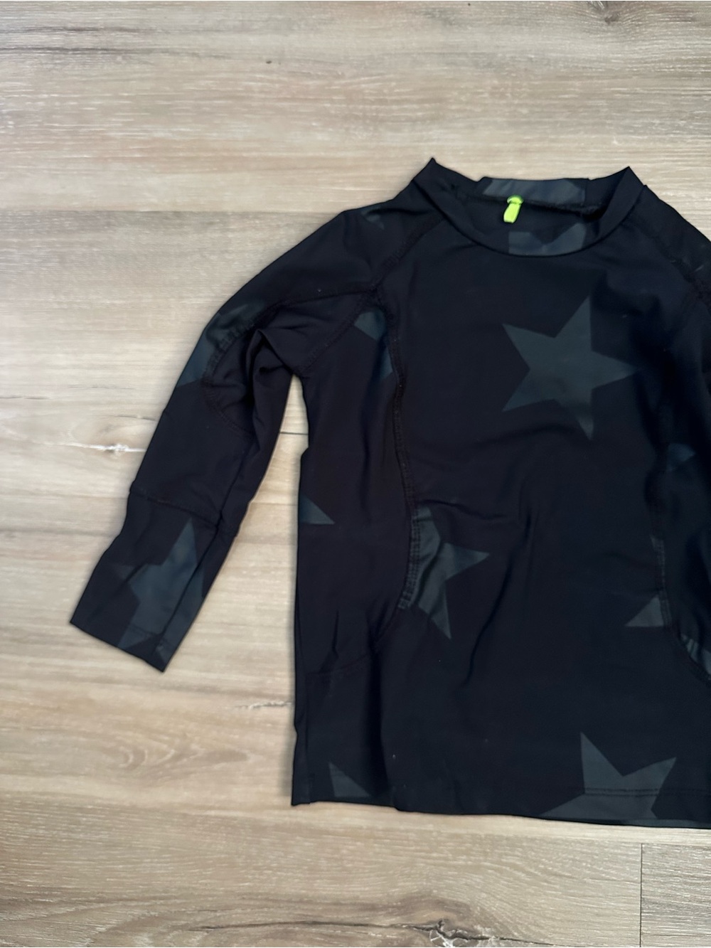 Nununu Black Star Rash Guard